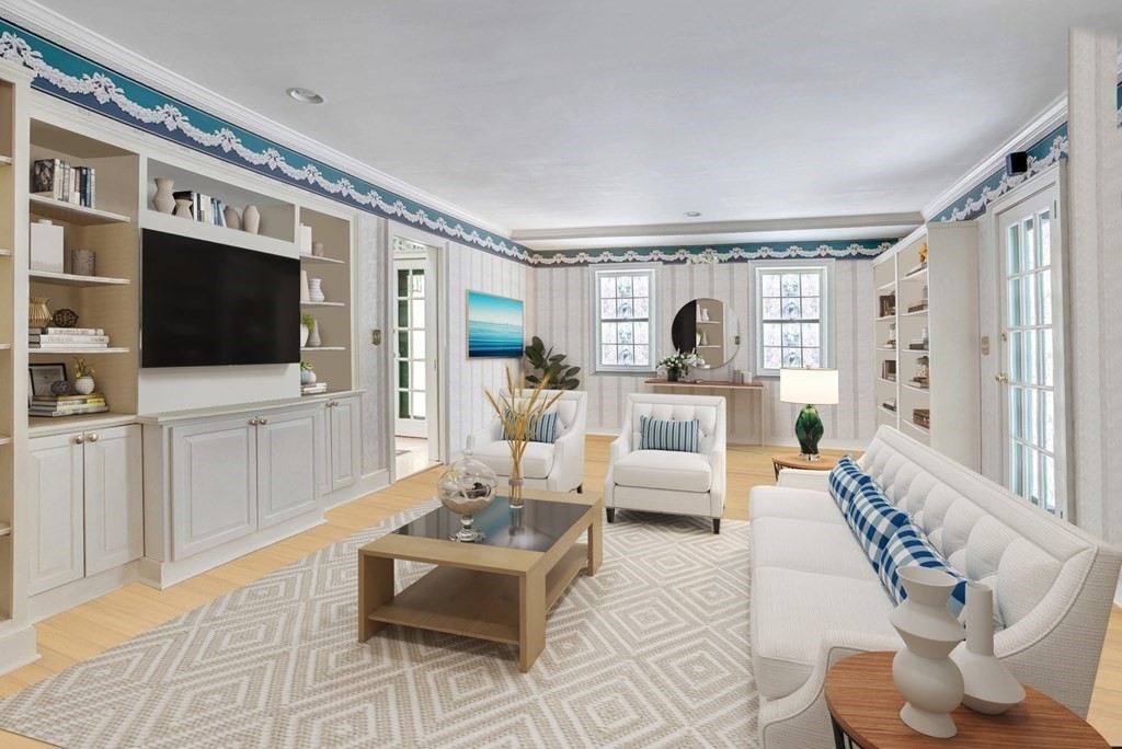 101 Holt Road Andover, MA 01810 - Photo 11 of 38 a living room with furniture and a flat screen tv