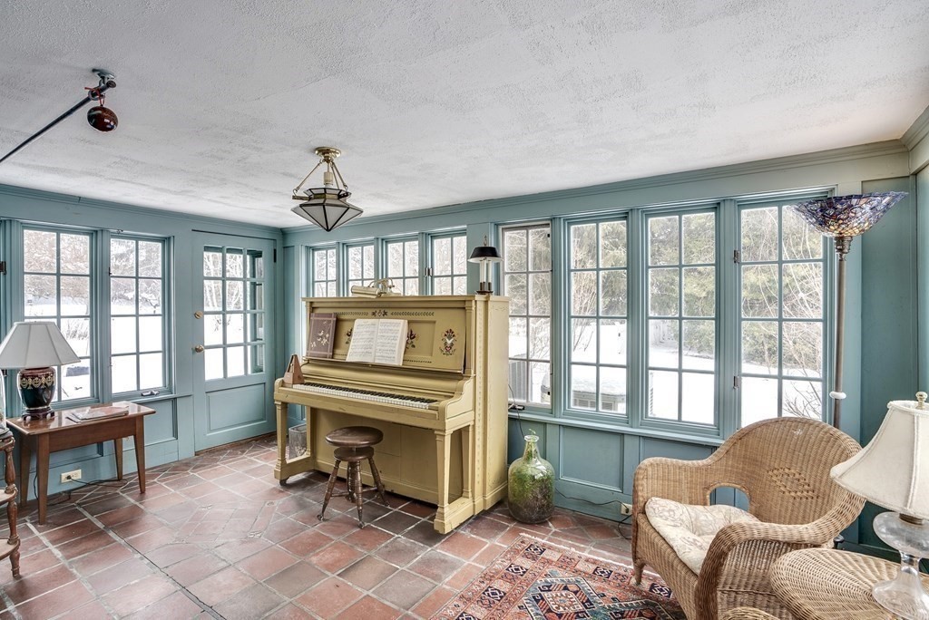 101 Holt Road Andover, MA 01810 - Photo 12 of 38 a living room with furniture and a large window