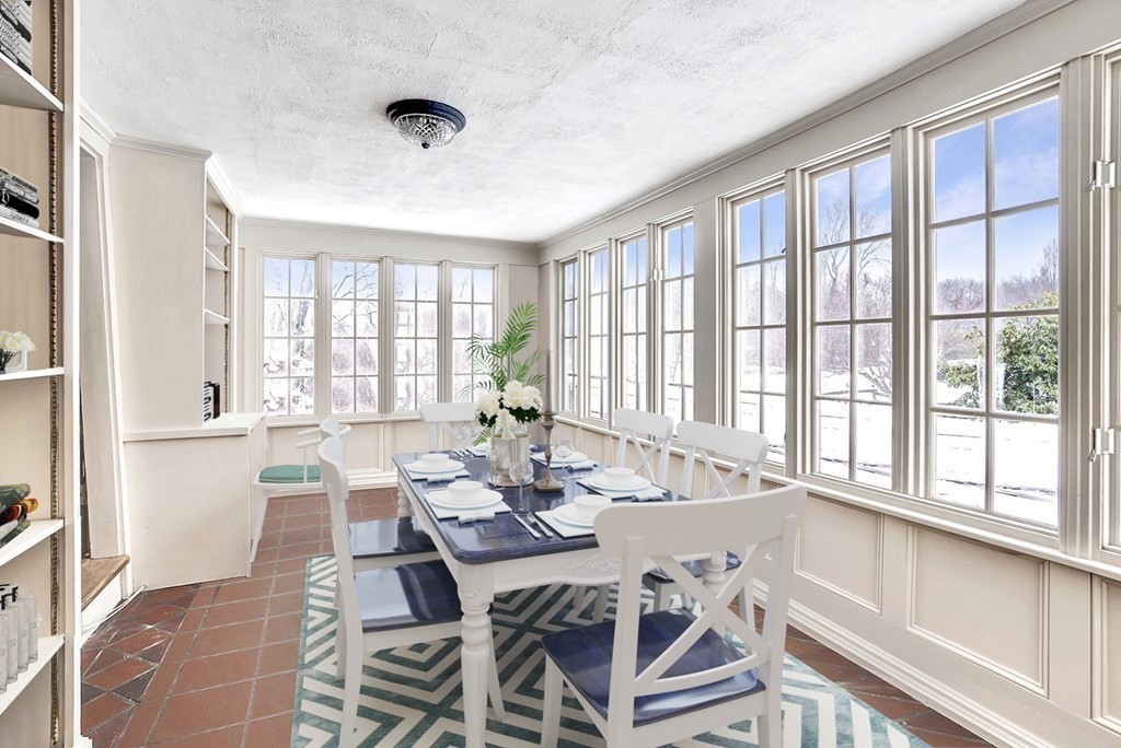 101 Holt Road Andover, MA 01810 - Photo 17 of 38 a view of a dining room with furniture window and outside view