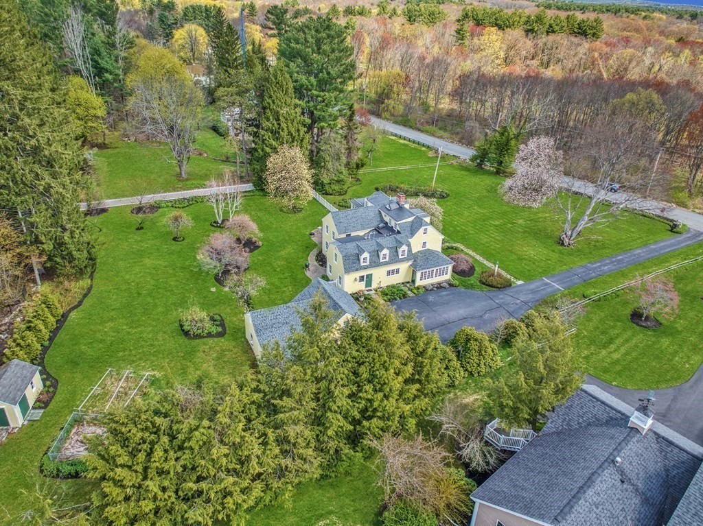 101 Holt Road Andover, MA 01810 - Photo 2 of 38 an aerial view of a house with a yard