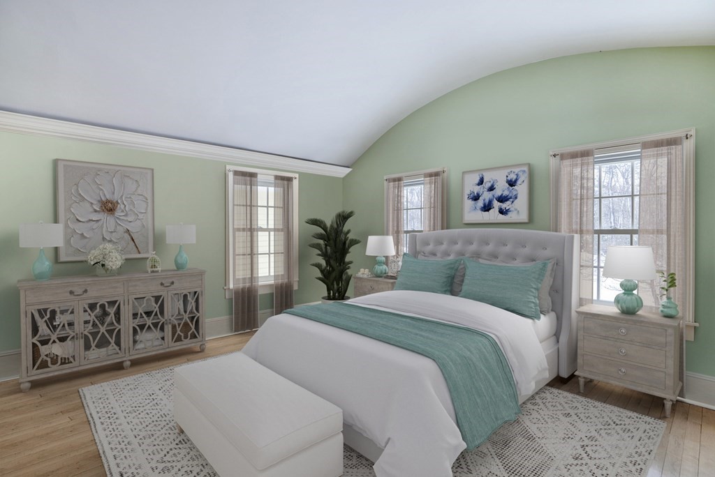 101 Holt Road Andover, MA 01810 - Photo 24 of 38 a bedroom with a large bed and a couch