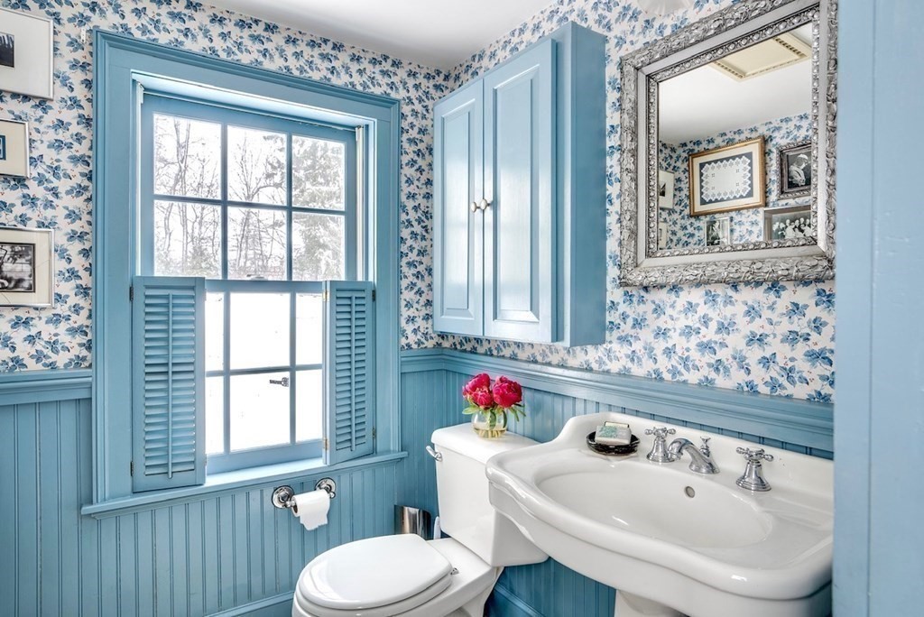 101 Holt Road Andover, MA 01810 - Photo 26 of 38 a bathroom with a sink and a mirror