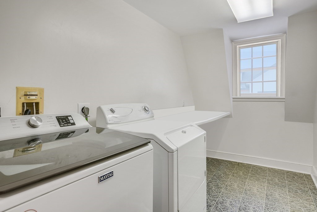 101 Holt Road Andover, MA 01810 - Photo 27 of 38 a utility room with dryer and washer