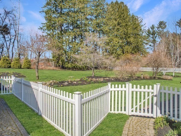 101 Holt Road Andover, MA 01810 - Photo 28 of 38 a view of a deck and yard with green yard