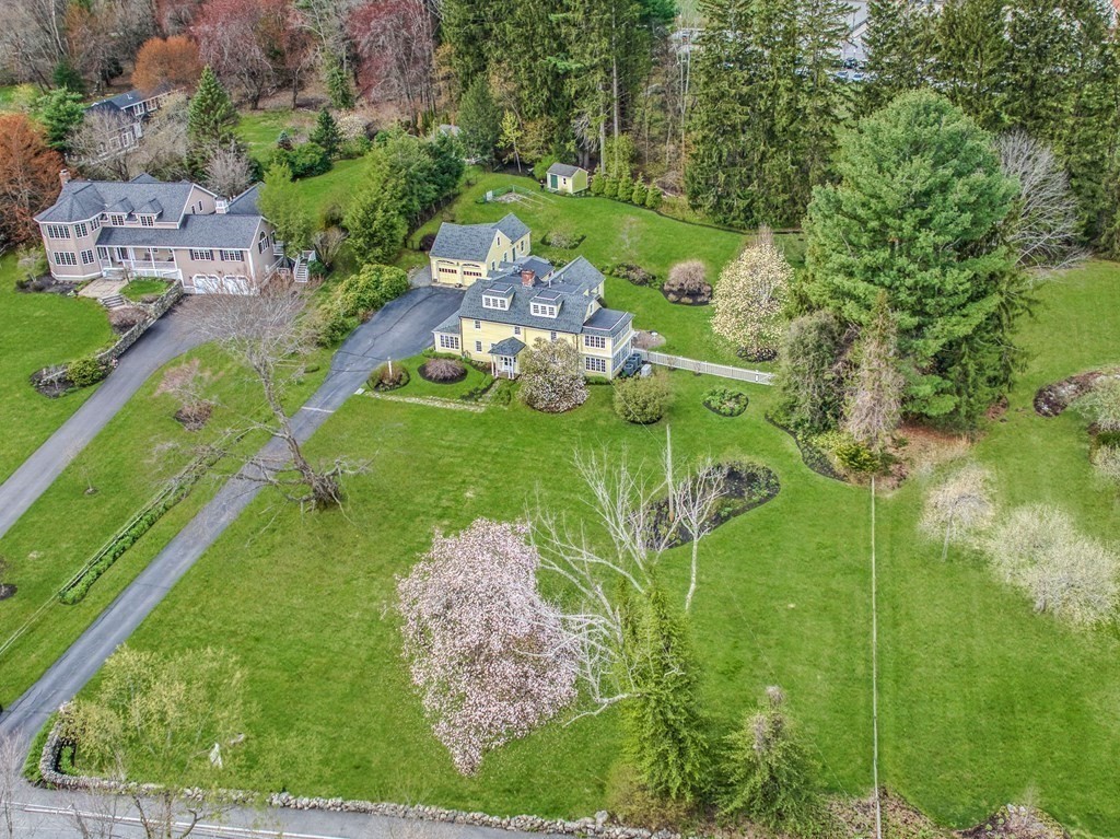101 Holt Road Andover, MA 01810 - Photo 4 of 38 an aerial view of a house with a yard