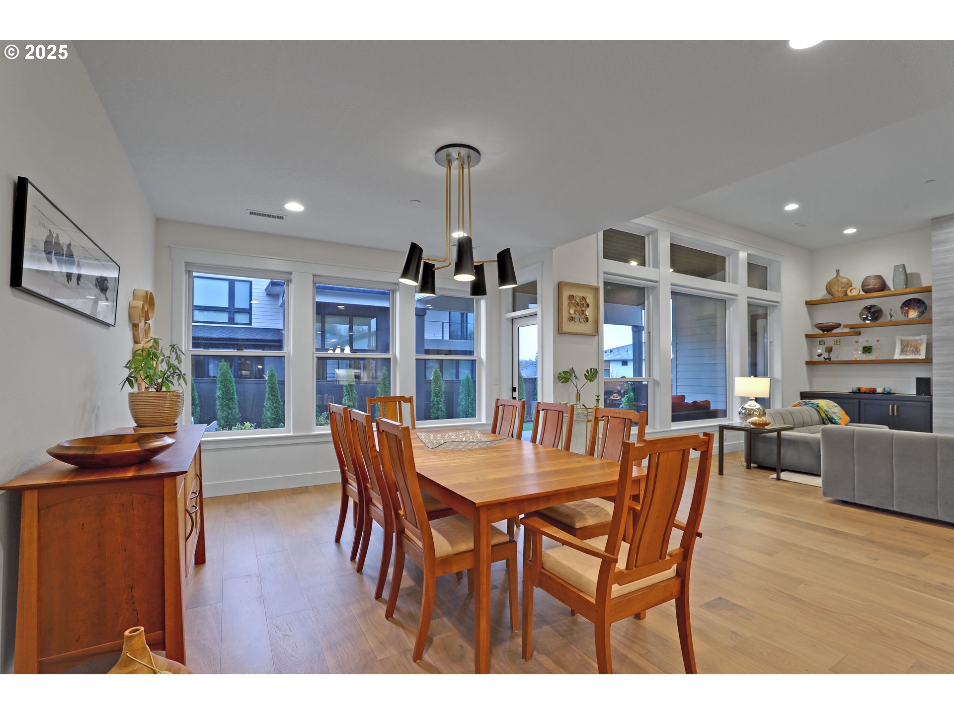 4336 Northwest Paddock Lane Camas, WA 98607 - Photo 12 of 39 a dining room with furniture and wooden floor
