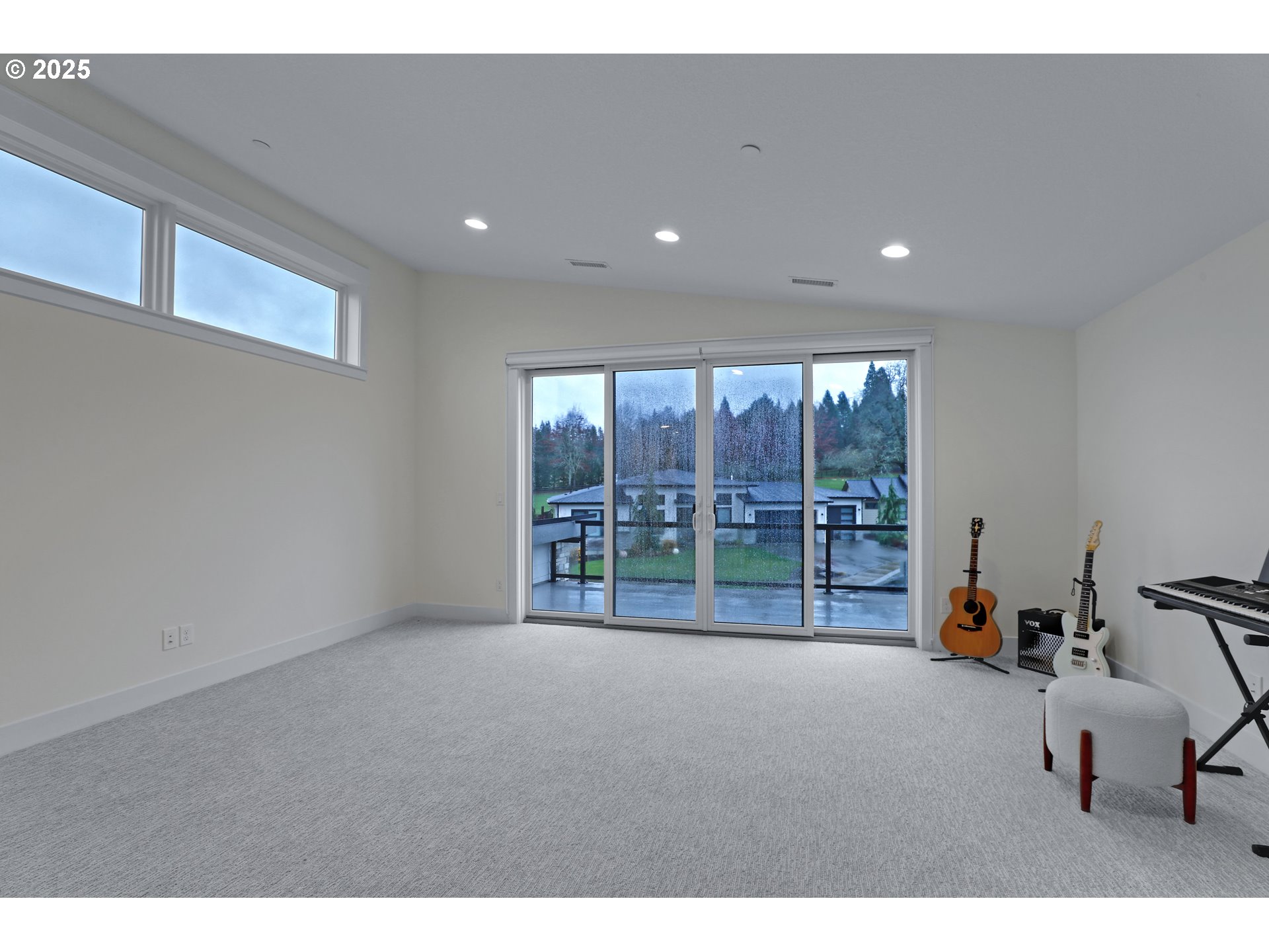 4336 Northwest Paddock Lane Camas, WA 98607 - Photo 30 of 39 a living room with a large window