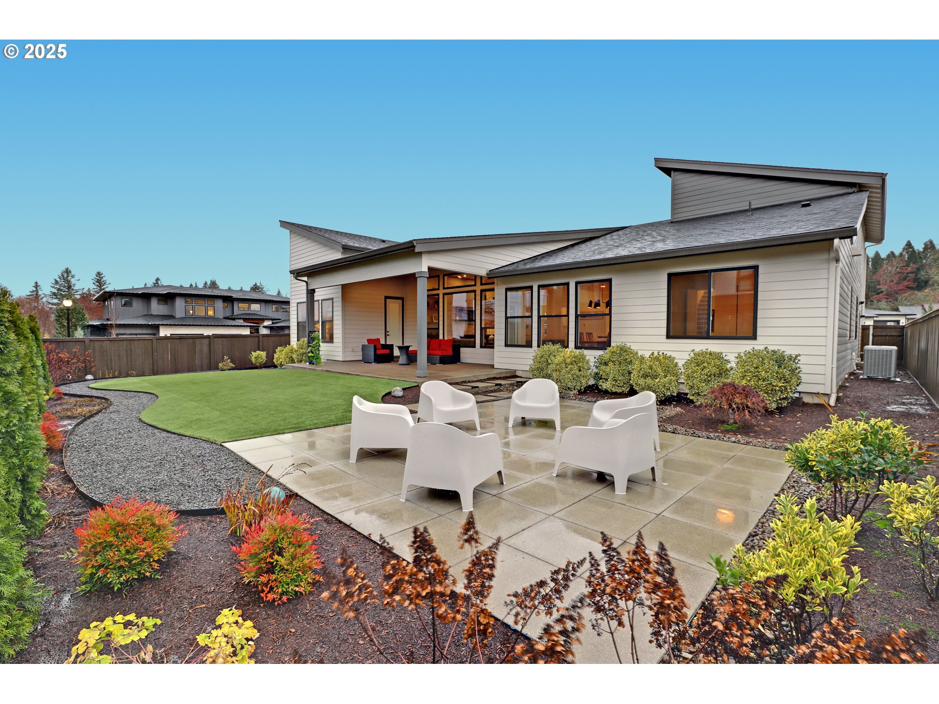 4336 Northwest Paddock Lane Camas, WA 98607 - Photo 35 of 39 a view of a house with backyard sitting area and garden