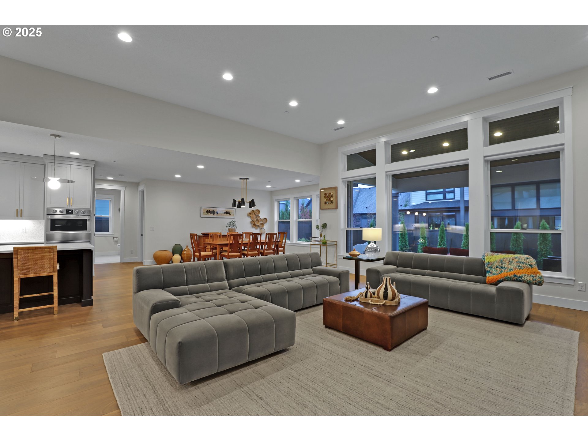 4336 Northwest Paddock Lane Camas, WA 98607 - Photo 9 of 39 a living room with furniture and a large window