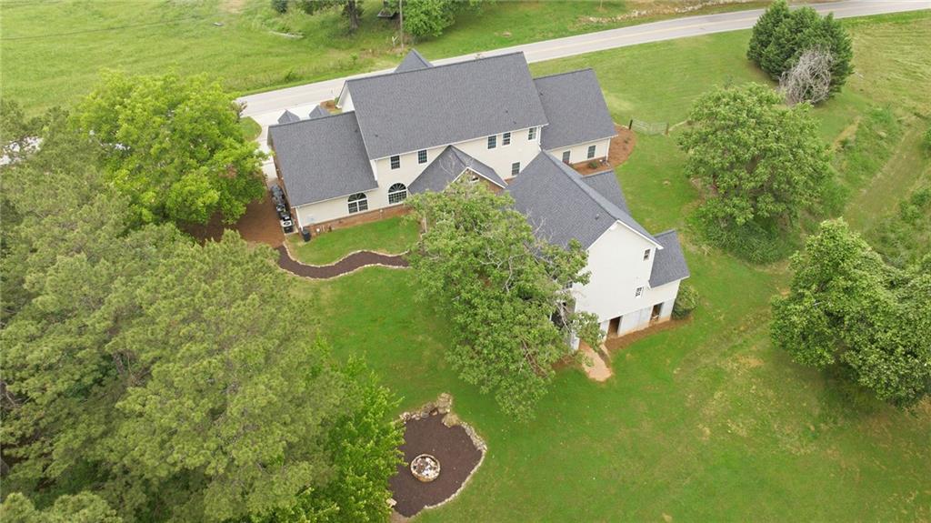 4337 Mountain View Road Oakwood, GA 30566 - Photo 70 of 84 an aerial view of a house with pool yard seating and yard