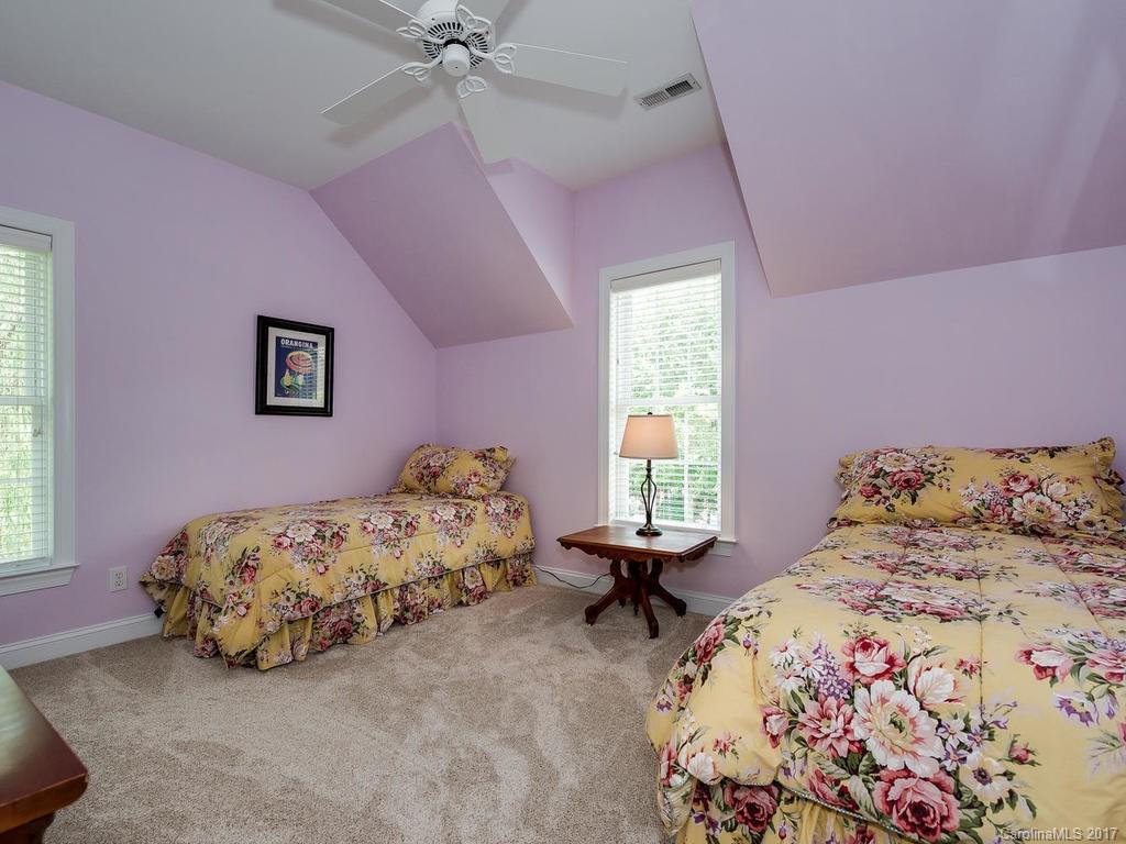 3247 Planters Ridge Road Charlotte, NC 28270 - Photo 16 of 24 a bedroom with a bed and window