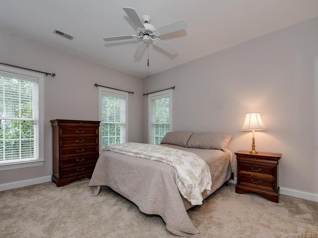 3247 Planters Ridge Road Charlotte, NC 28270 - Photo 18 of 24 a bedroom with a bed dresser and a window