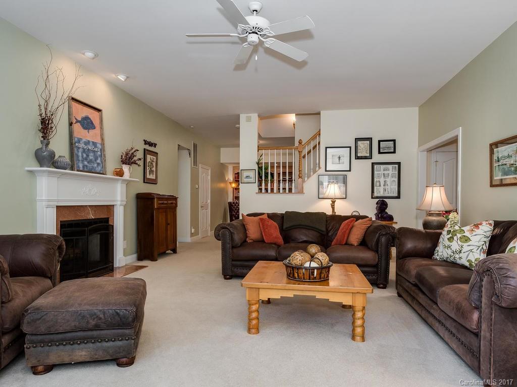 3247 Planters Ridge Road Charlotte, NC 28270 - Photo 19 of 24 a living room with furniture and a fireplace