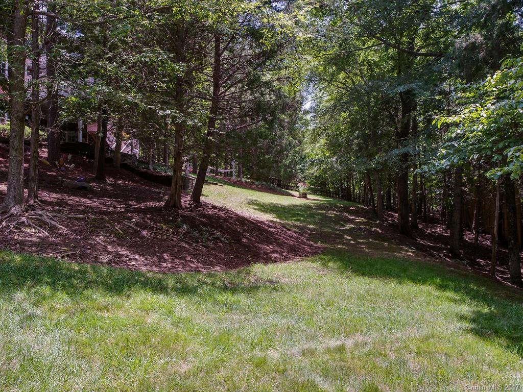 3247 Planters Ridge Road Charlotte, NC 28270 - Photo 24 of 24 a view of a backyard with trees