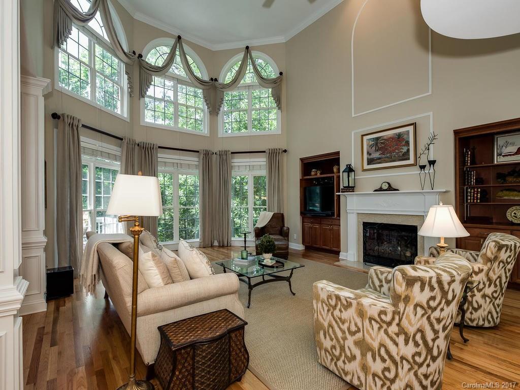 3247 Planters Ridge Road Charlotte, NC 28270 - Photo 5 of 24 a living room with furniture fireplace and large windows