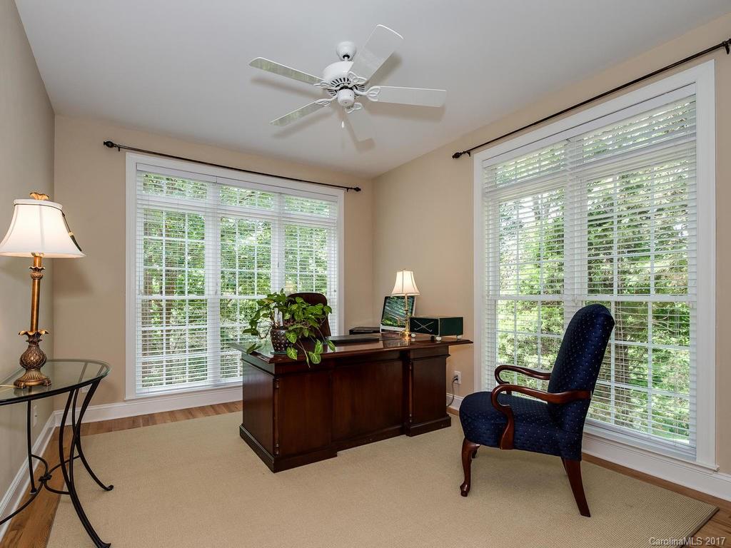 3247 Planters Ridge Road Charlotte, NC 28270 - Photo 7 of 24 a view of a workspace with furniture and a window