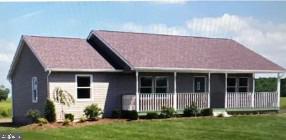 29007 Adventist Drive Salisbury, MD 21801 - Photo 2 of 4 a front view of a house with a yard