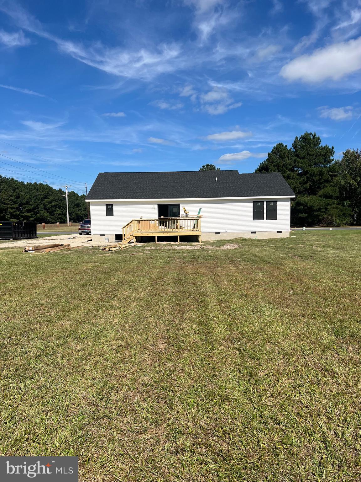 29007 Adventist Drive Salisbury, MD 21801 - Photo 3 of 4 a view of a big yard with a house in the background