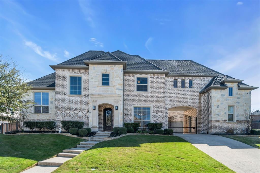 960 Packsaddle Trail Prosper, TX 75078 - Photo 1 of 40 a front view of a house with a yard