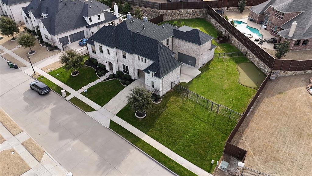 960 Packsaddle Trail Prosper, TX 75078 - Photo 38 of 40 an aerial view of a residential houses with outdoor space