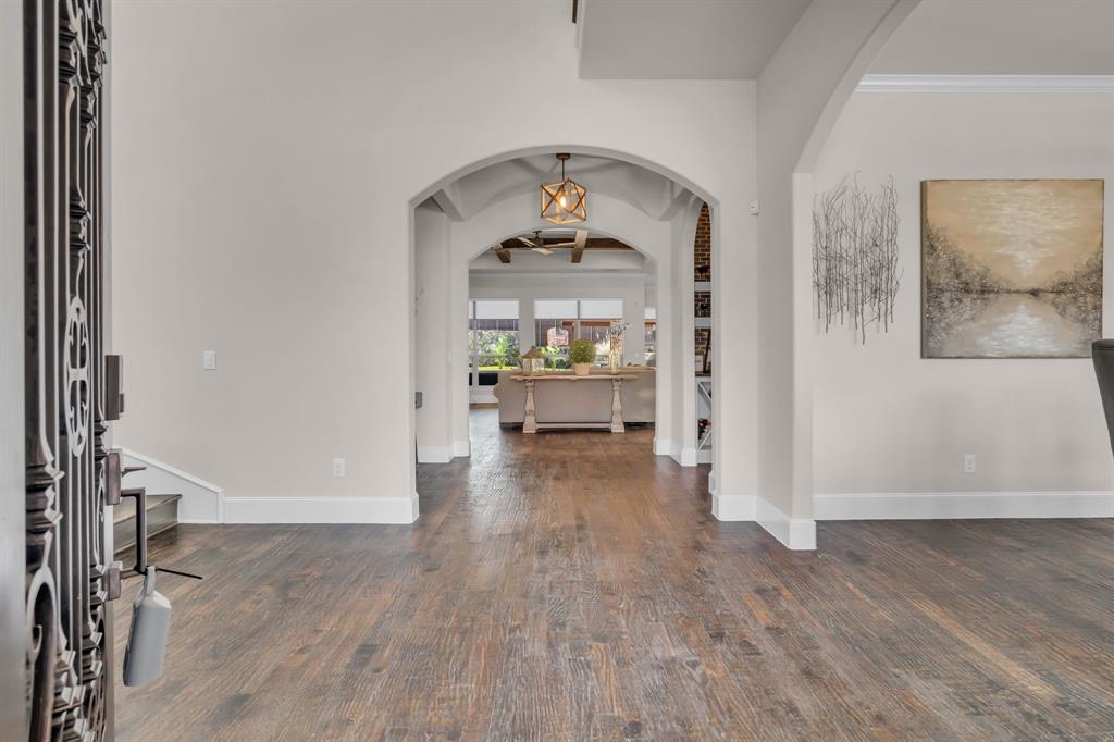 960 Packsaddle Trail Prosper, TX 75078 - Photo 5 of 40 wooden floor in an empty room with a window