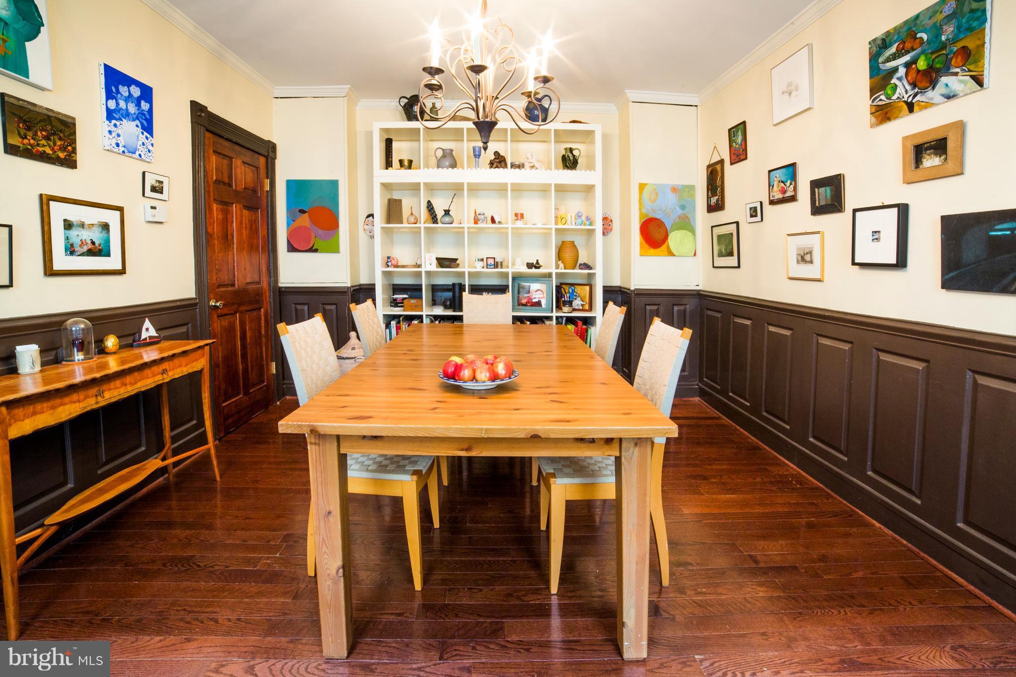 4535 Keswick Road Baltimore, MD 21210 - Photo 12 of 30 a view of a dining room with furniture and wooden floor