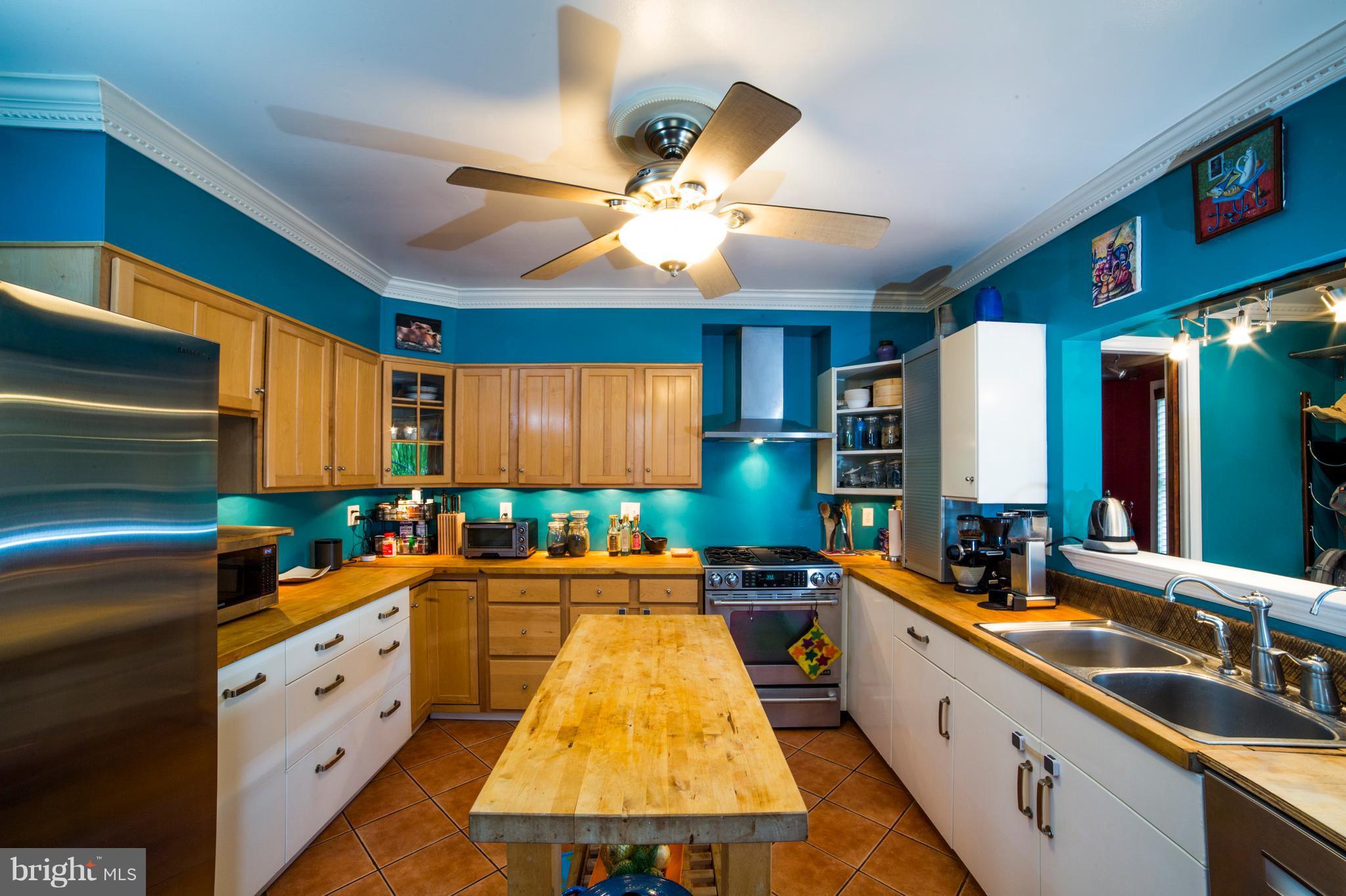 4535 Keswick Road Baltimore, MD 21210 - Photo 15 of 30 a kitchen with lots of counter space and a sink