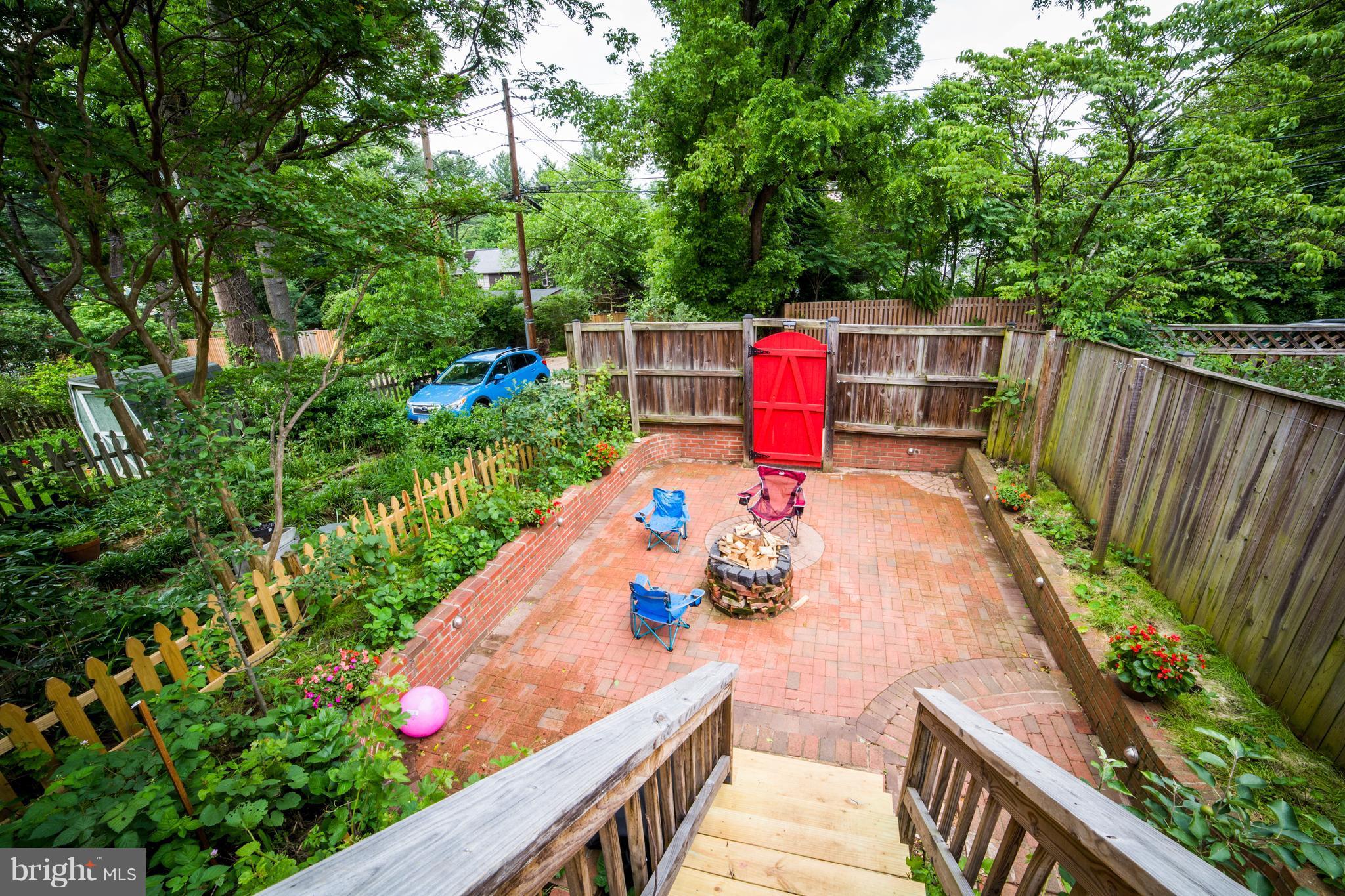4535 Keswick Road Baltimore, MD 21210 - Photo 29 of 30 a view of a chairs and tables in the backyard