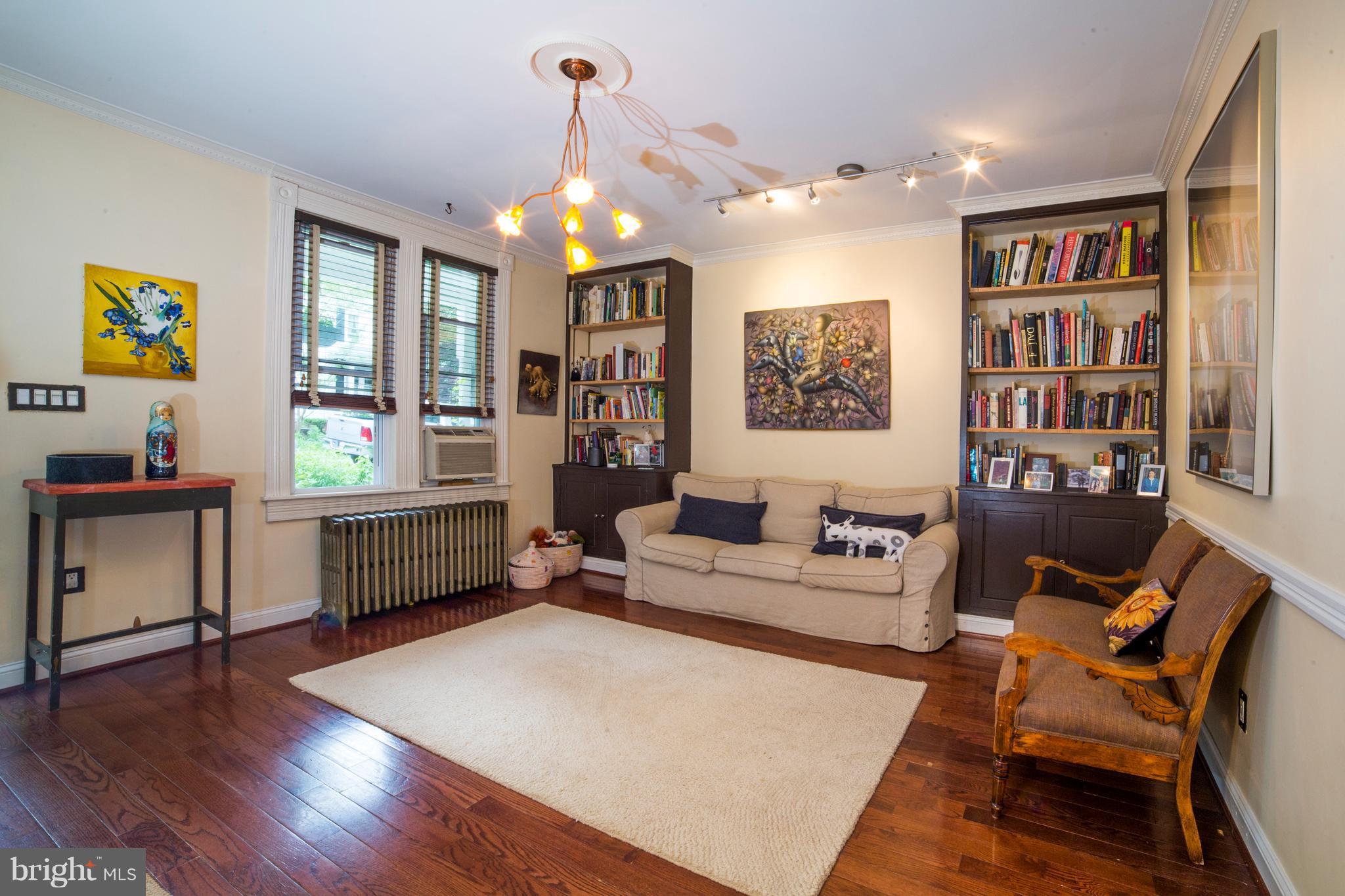 4535 Keswick Road Baltimore, MD 21210 - Photo 6 of 30 a living room with furniture and a wooden floor