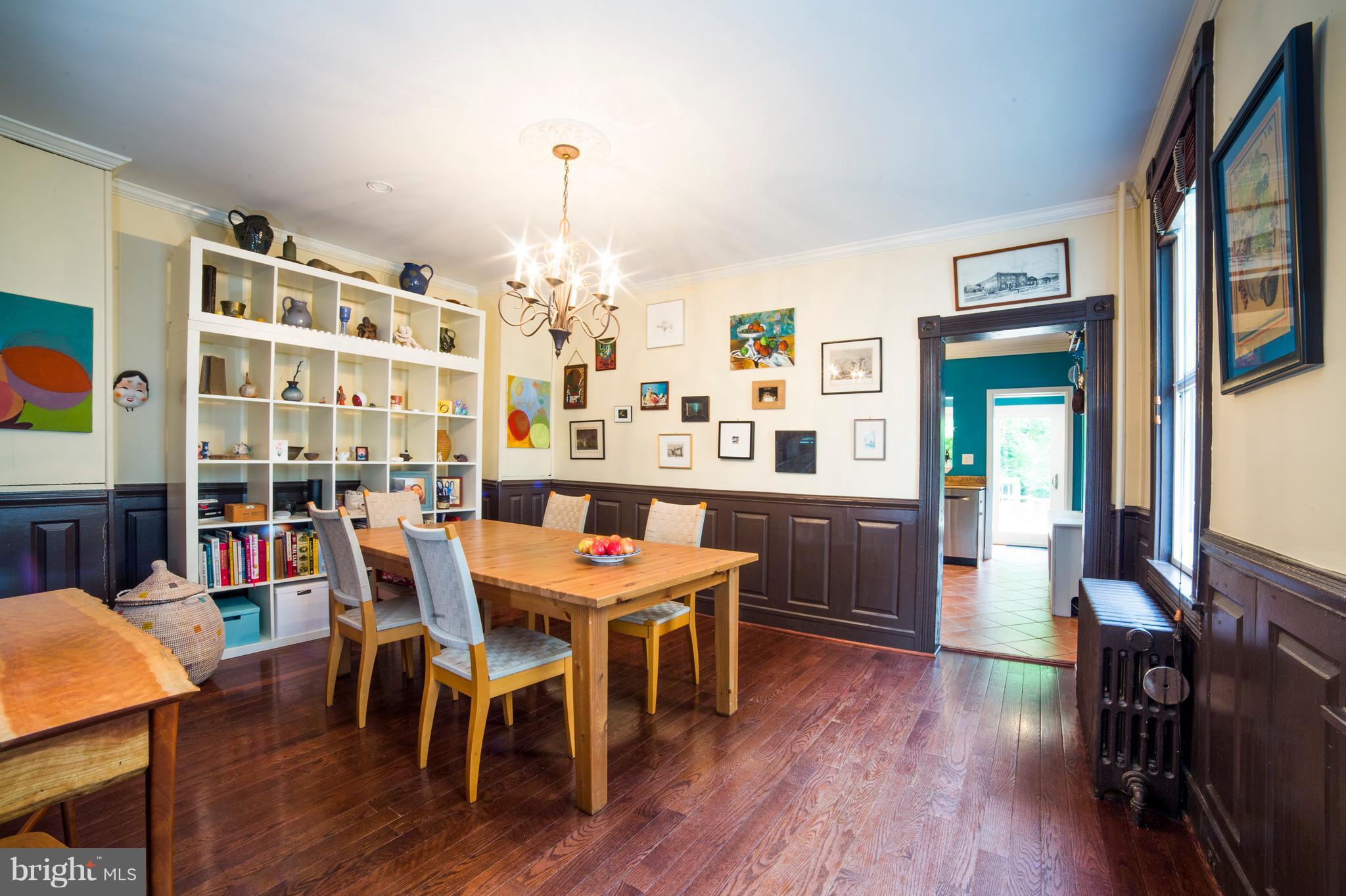 4535 Keswick Road Baltimore, MD 21210 - Photo 8 of 30 a view of a dining room with furniture and wooden floor