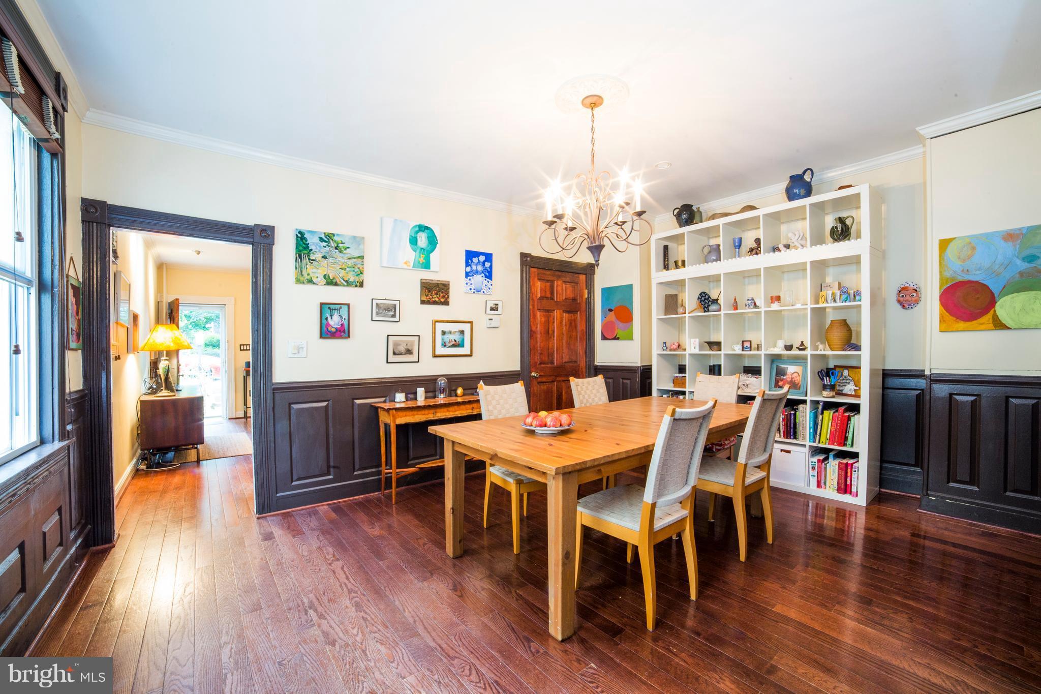 4535 Keswick Road Baltimore, MD 21210 - Photo 9 of 30 a view of a dining room with furniture and wooden floor