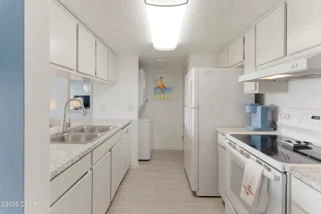 $225,000 | 6909 North Lagoon Drive, Unit 3E, Panama City, FL 32408