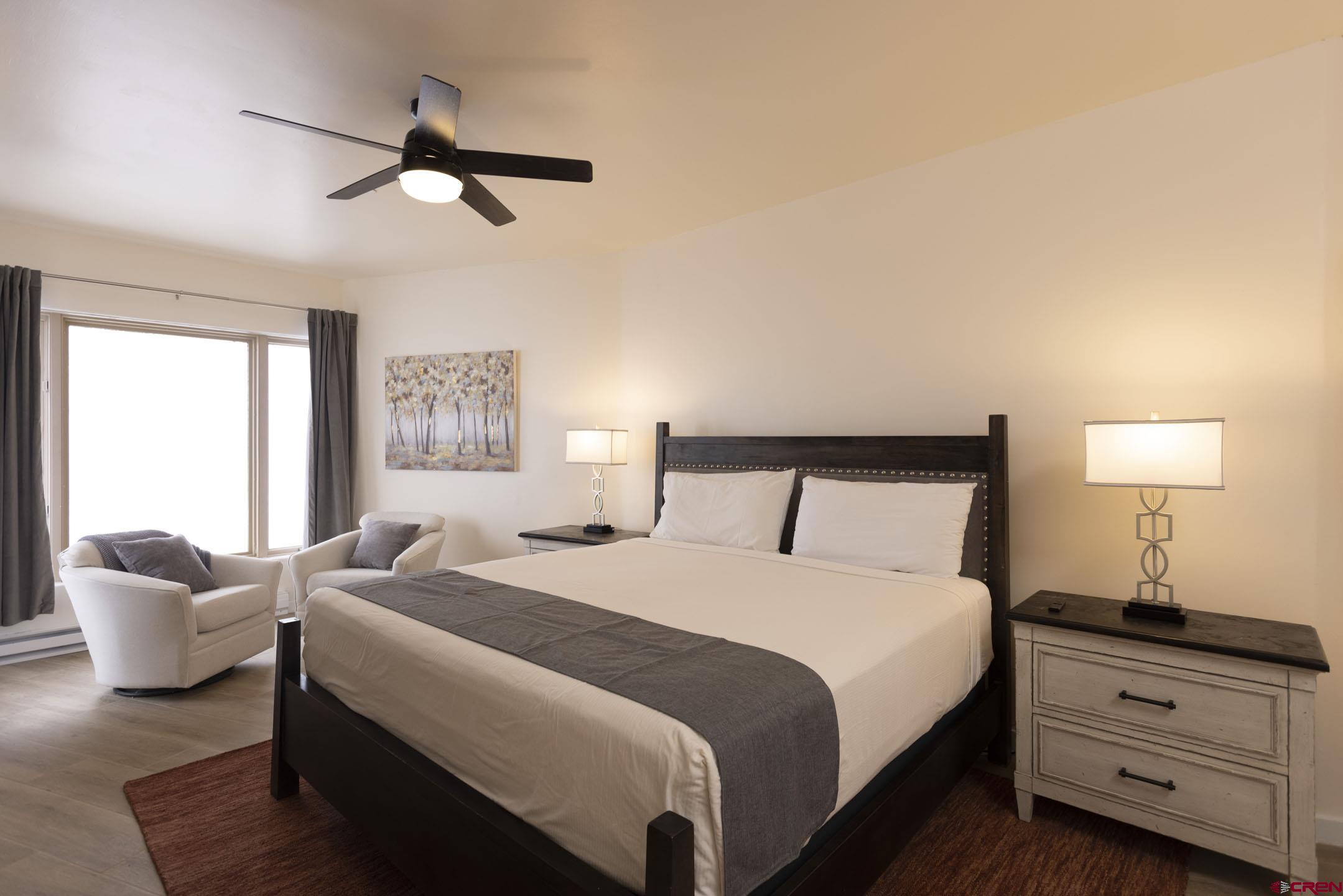 117 Needles Way, Unit 720 Durango, CO 81301 - Photo 17 of 33 a bedroom with a bed and a couch