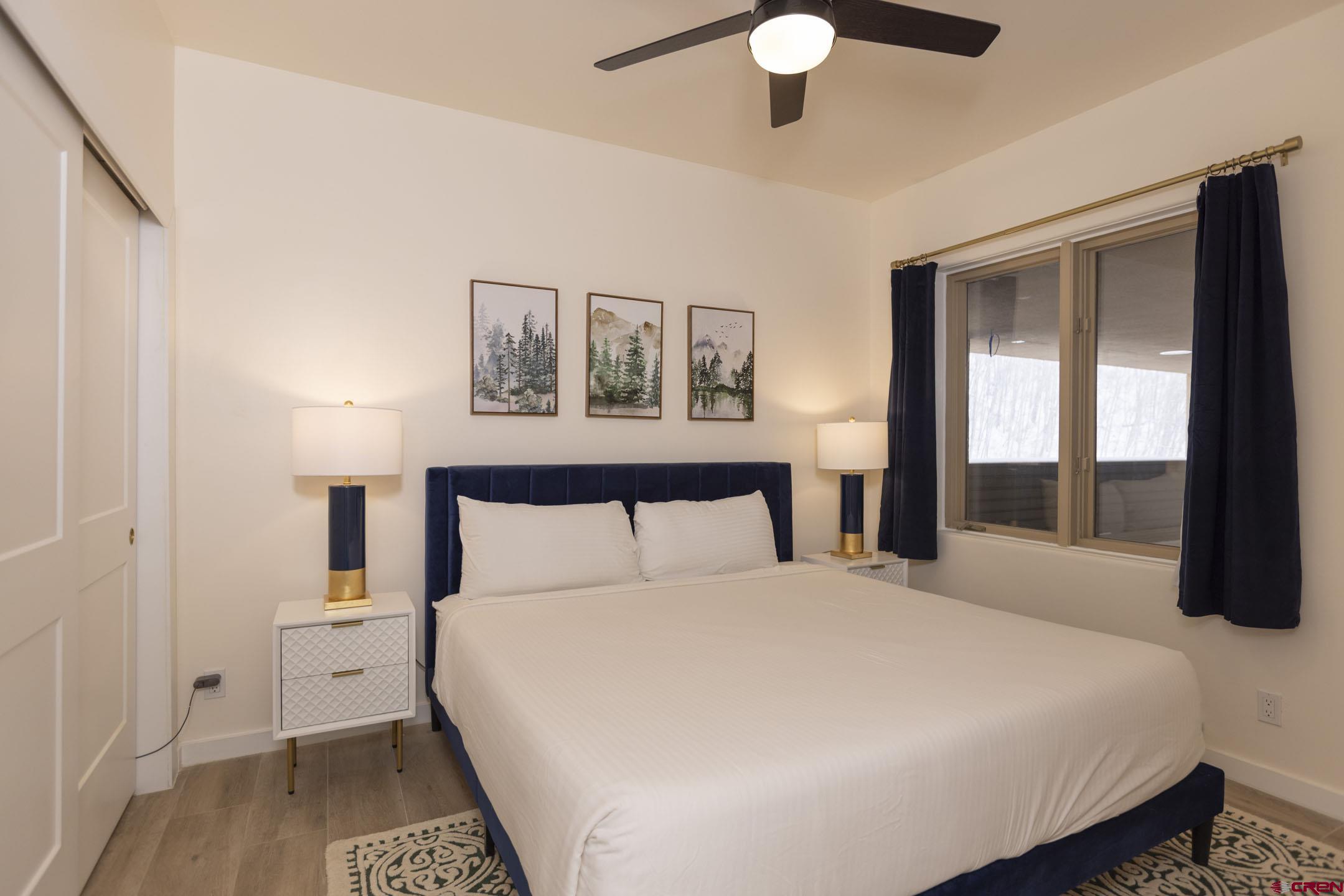 117 Needles Way, Unit 720 Durango, CO 81301 - Photo 20 of 33 a large white bed in a white room