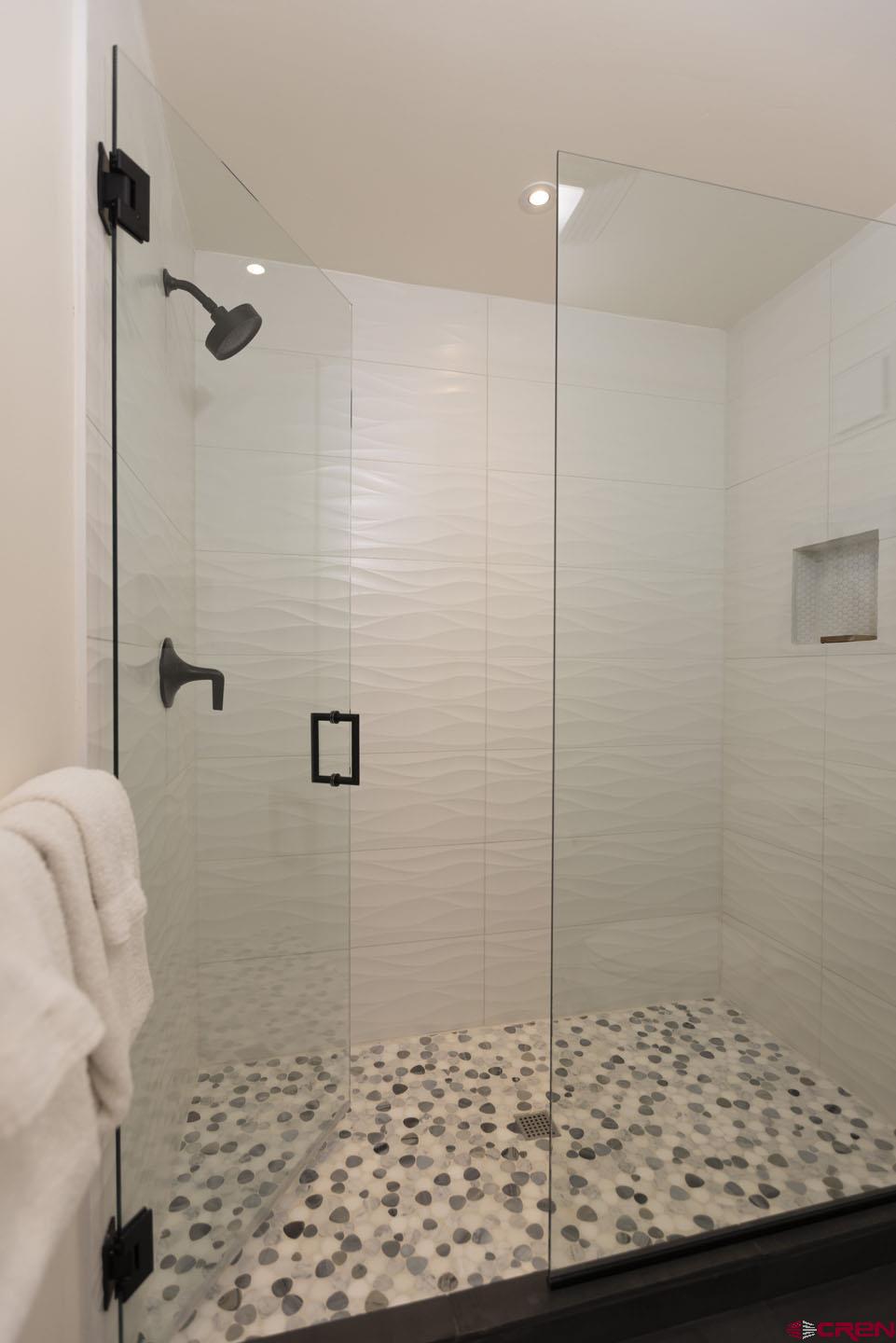 117 Needles Way, Unit 720 Durango, CO 81301 - Photo 22 of 33 a bathroom with a shower