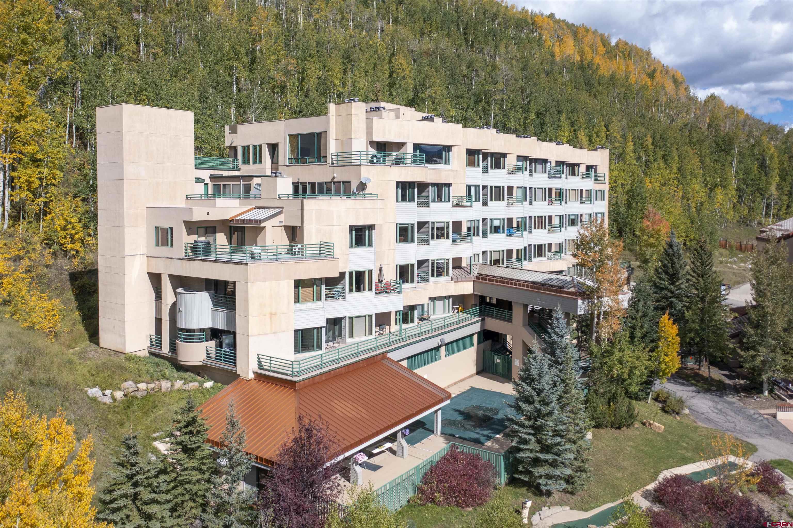 117 Needles Way, Unit 720 Durango, CO 81301 - Photo 23 of 33 front view of a building with a yard