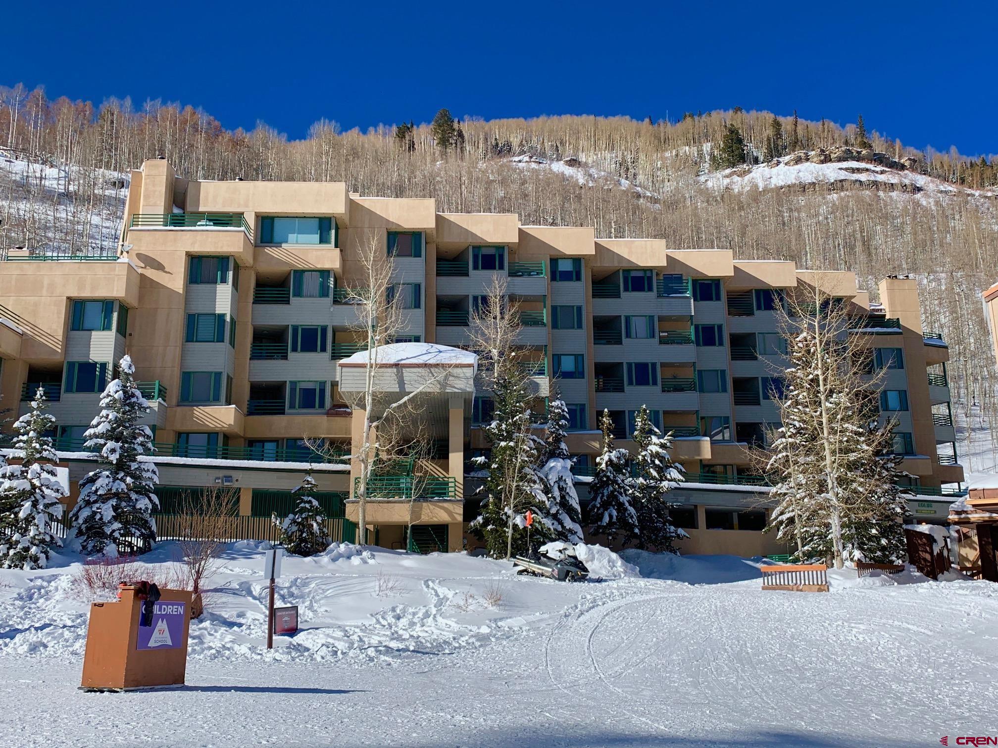117 Needles Way, Unit 720 Durango, CO 81301 - Photo 24 of 33 a front view of a building with street view