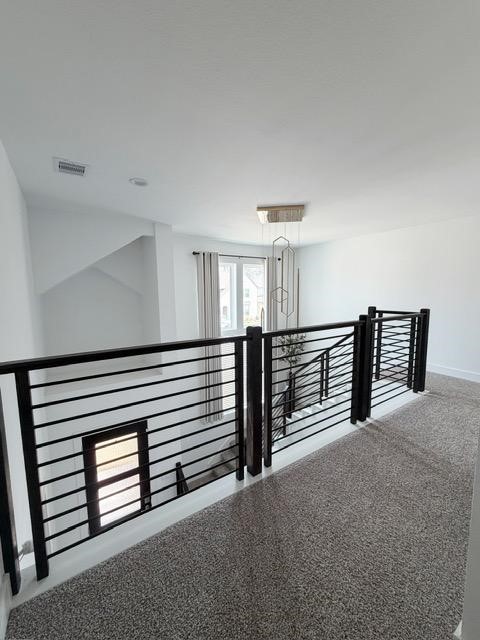 13725 Rising Sun Lane Conroe, TX 77384 - Photo 21 of 29 a view of a hallway with seating space