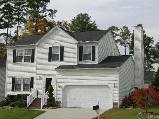 3009 Emcutta Court Raleigh, NC 27604 - Photo 1 of 1 a front view of a house with a yard and garage