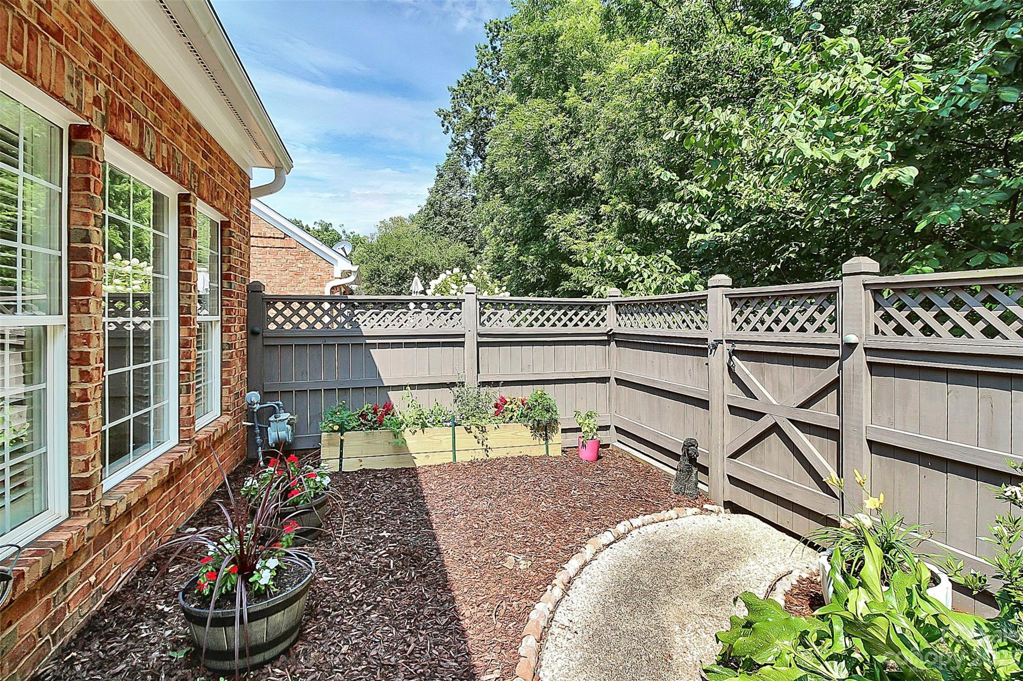 218 Robinlynn Road Matthews, NC 28105 - Photo 21 of 24 a view of a chairs and table in the balcony