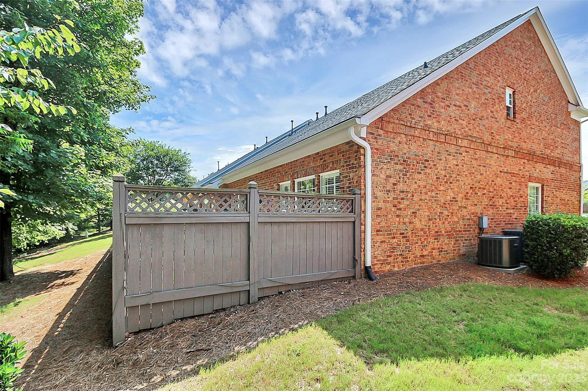 218 Robinlynn Road Matthews, NC 28105 - Photo 3 of 24 a view of a backyard