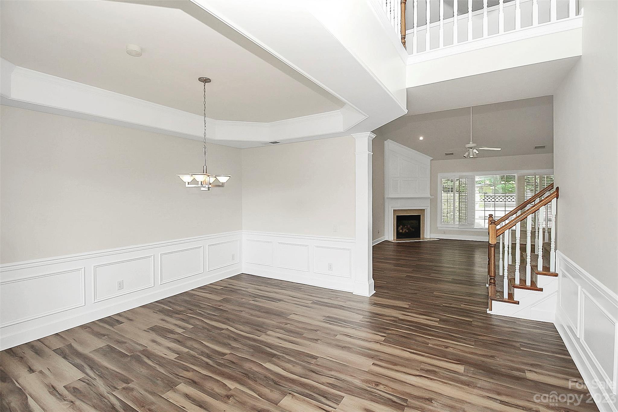 218 Robinlynn Road Matthews, NC 28105 - Photo 8 of 24 wooden floor in an empty room with a window