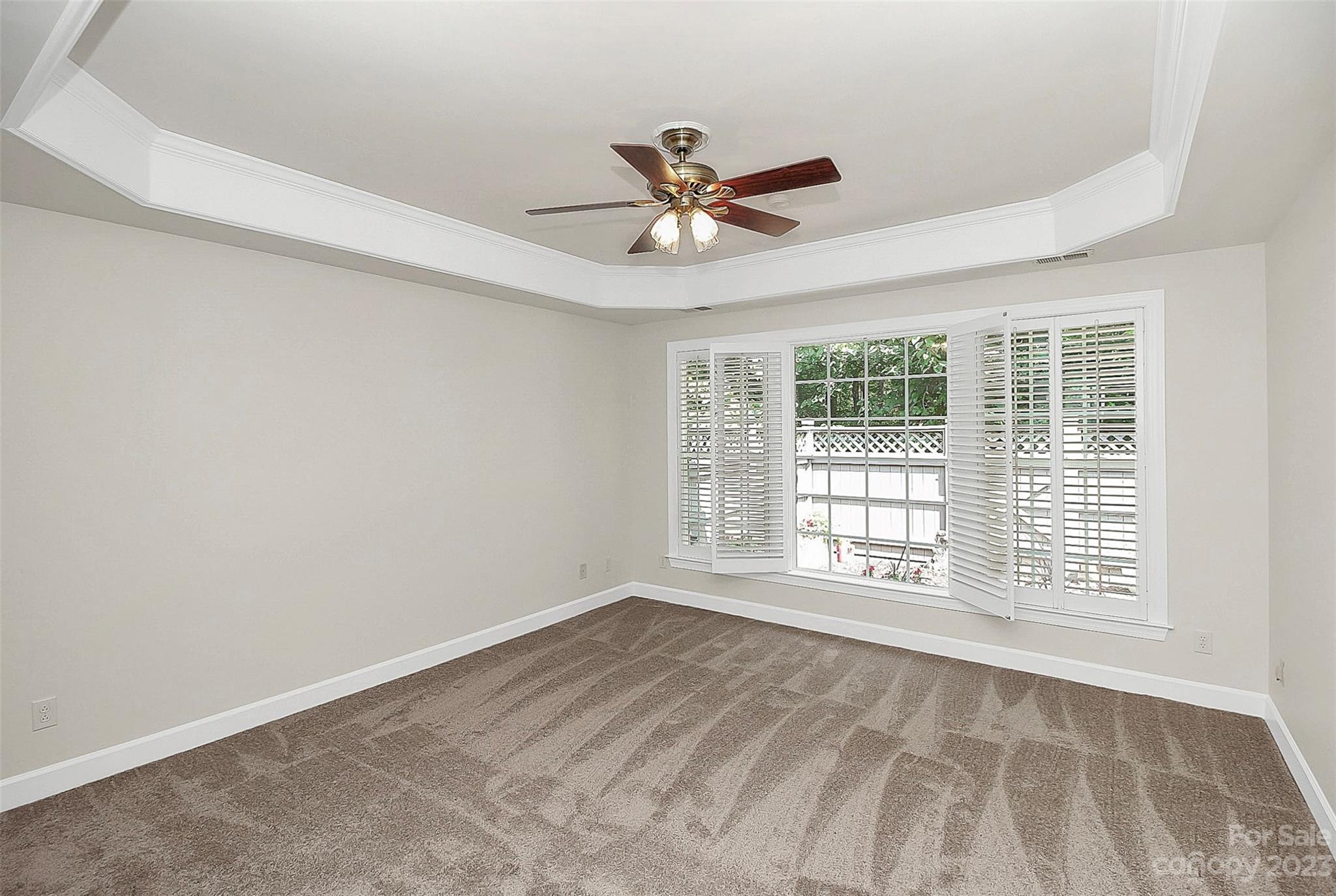 218 Robinlynn Road Matthews, NC 28105 - Photo 9 of 24 a view of an empty room with a window