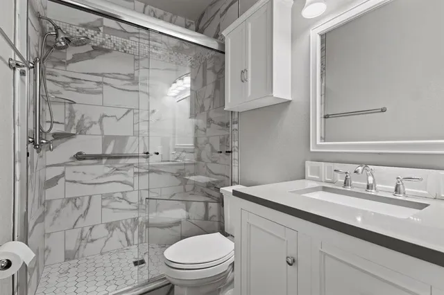 a view of a wooden deck and a yard