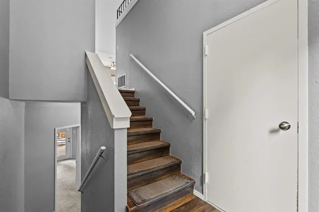 a view of entryway with wooden floor