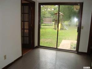 125 Bobwhite Road Cheraw, SC 29520 - Photo 5 of 6 a view of an empty room and window