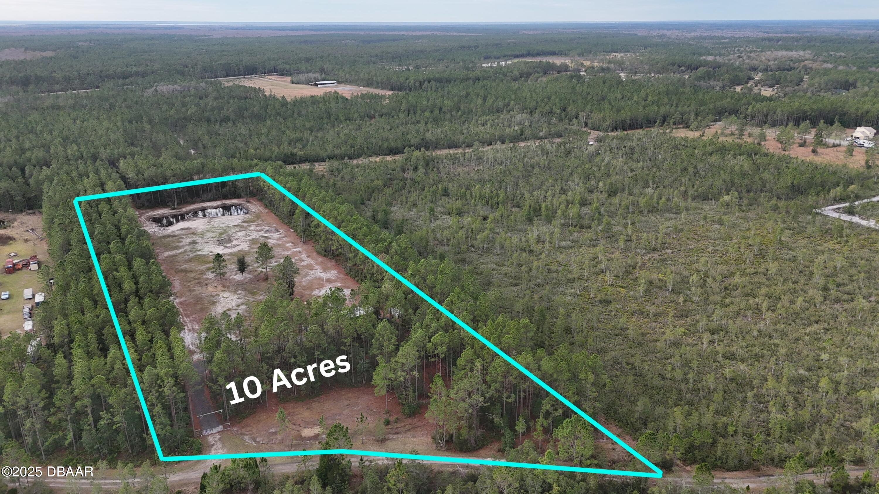 810 Wild Cur Road Pierson, FL 32180 - Photo 1 of 14 a view of a wooden bridge