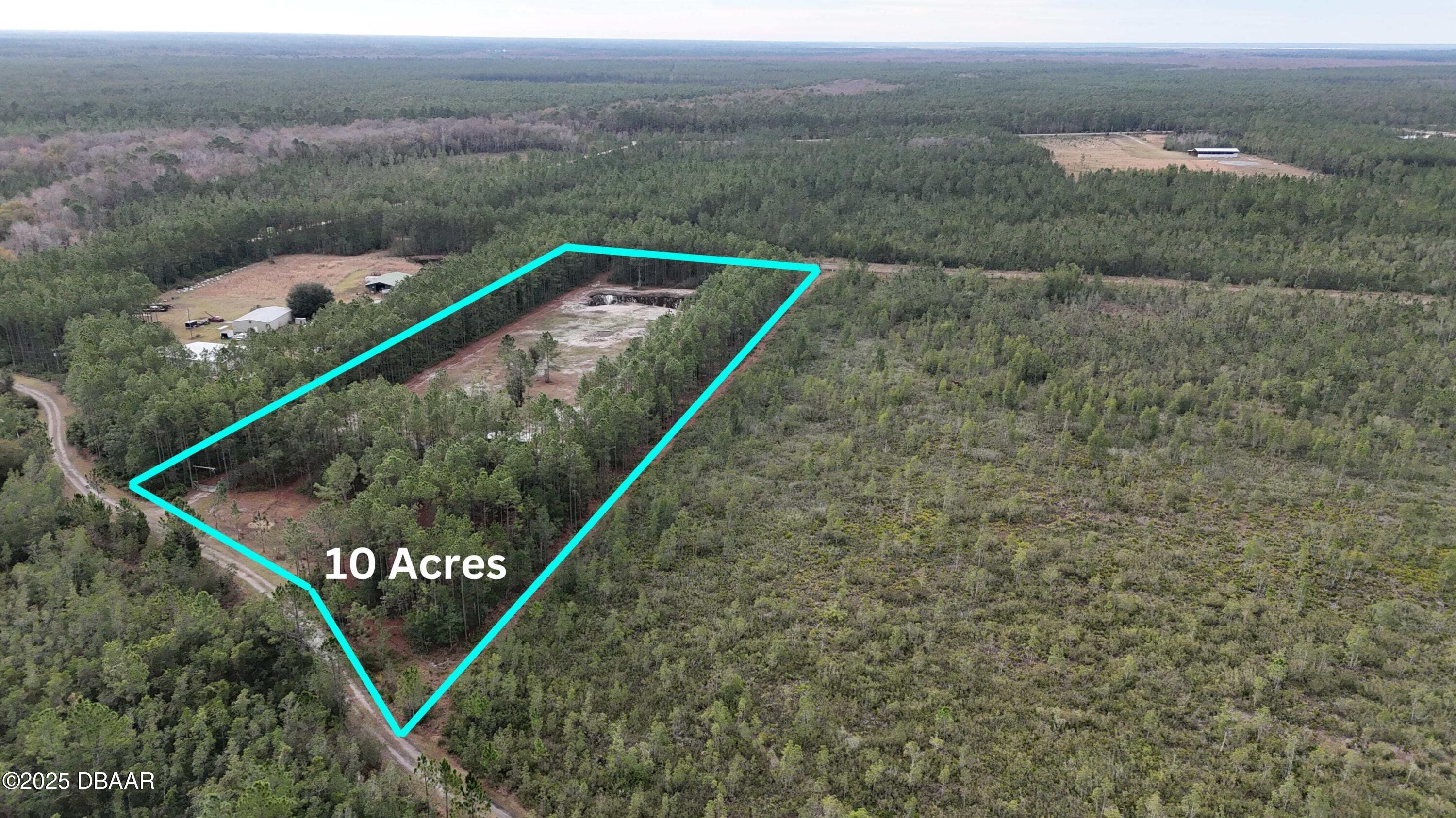 810 Wild Cur Road Pierson, FL 32180 - Photo 4 of 14 a view of a tennis court