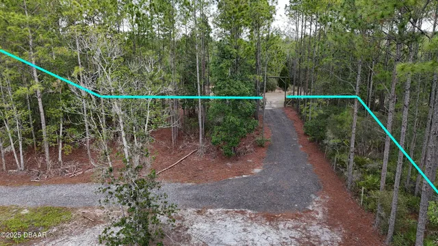 a view of a pathway with a park