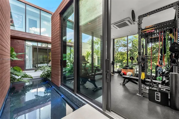 a view of a room with gym equipment